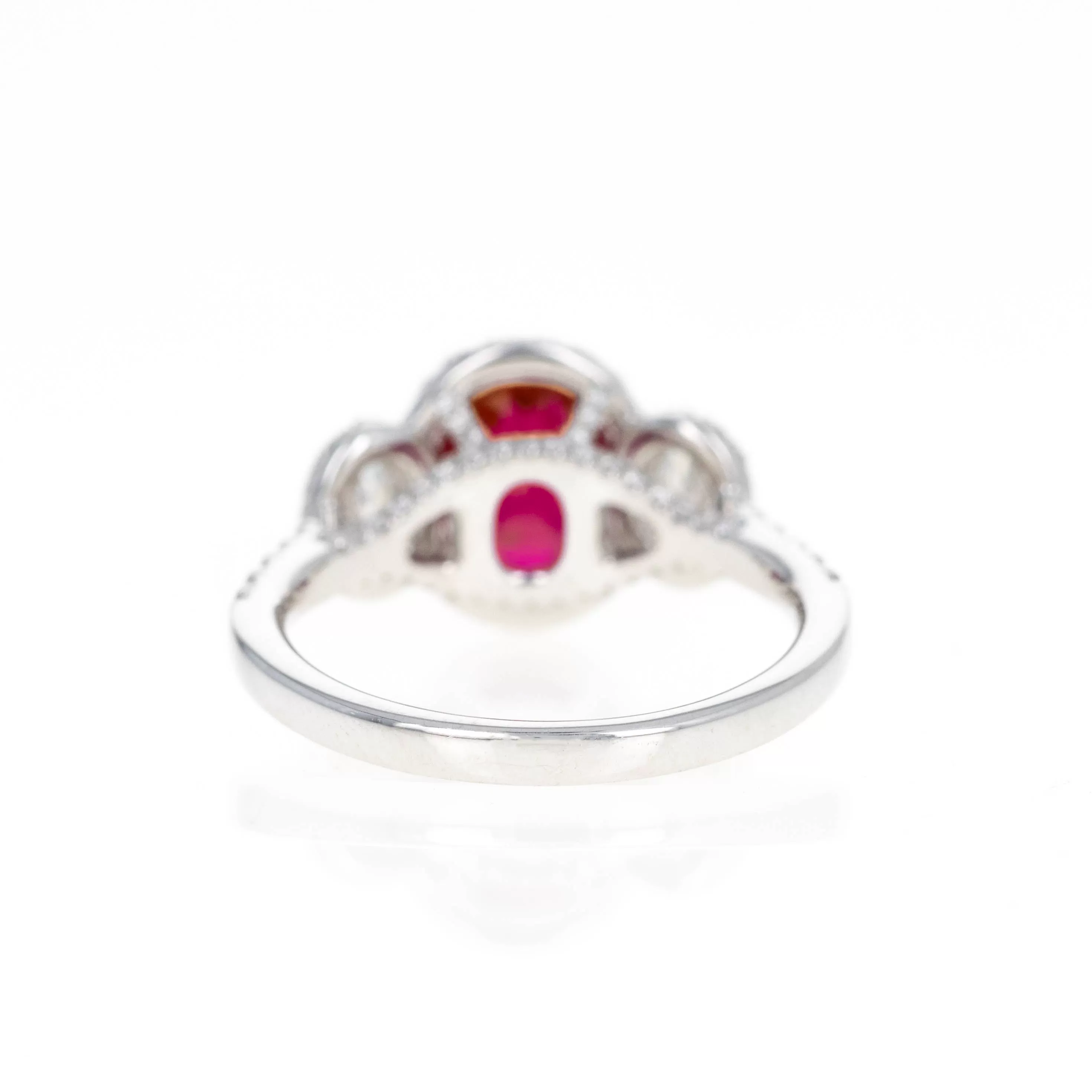 Platinum 0.94 Carat Oval Natural Ruby Diamond Three Stone Halo Ring